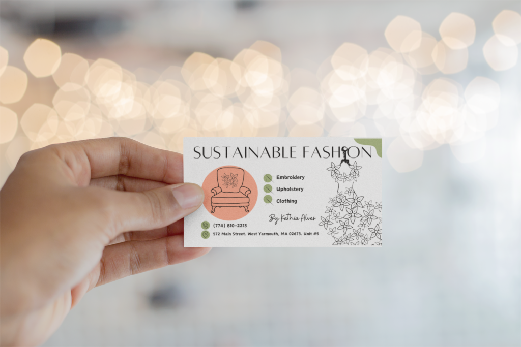 mockup-of-a-business-card-being-held-against-blurred-lights-21915