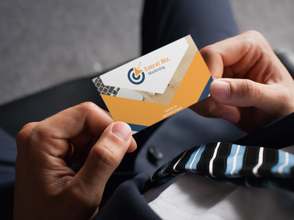 mockup-of-a-man-holding-a-business-card-with-an-embossed-texture-33770 (1) (1)
